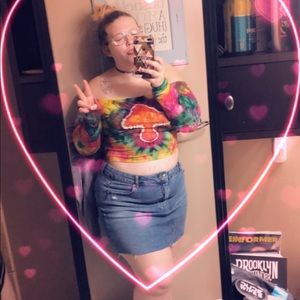 Distressed denim mini skirt